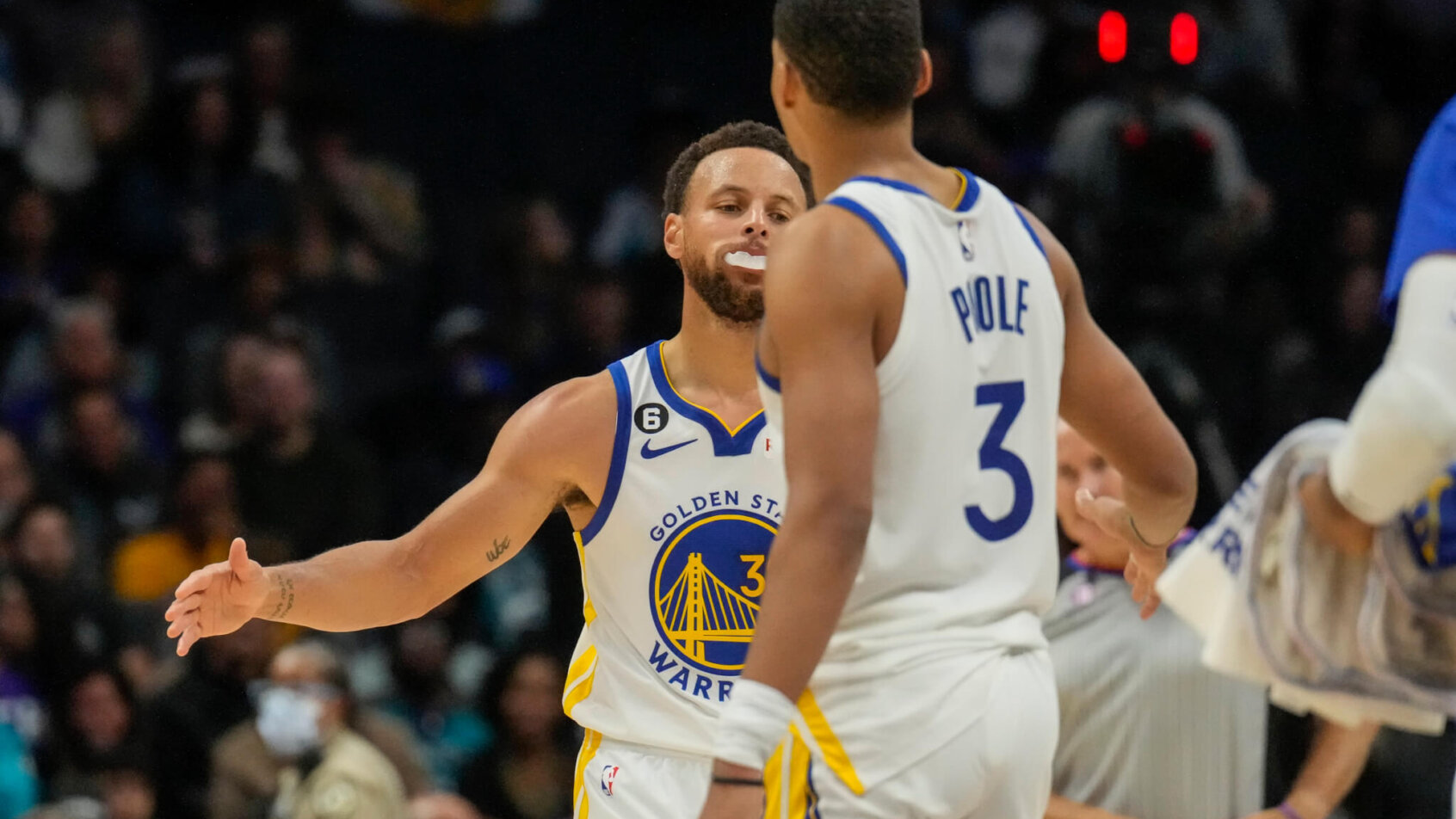 Steph Curry and Jordan Poole high five