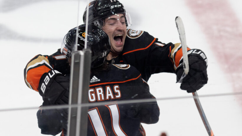 Anaheim Ducks center Trevor Zegras celebrates the game-winning overtime goal with right wing Frank Vatrano