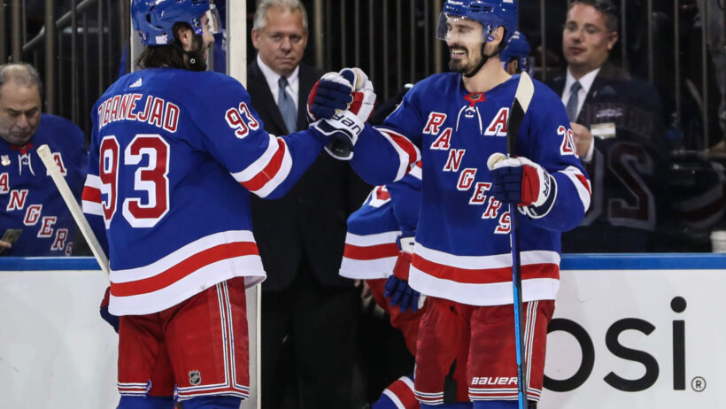 New York Rangers left wing Chris Kreider celebrates with center Mika Zibanejad