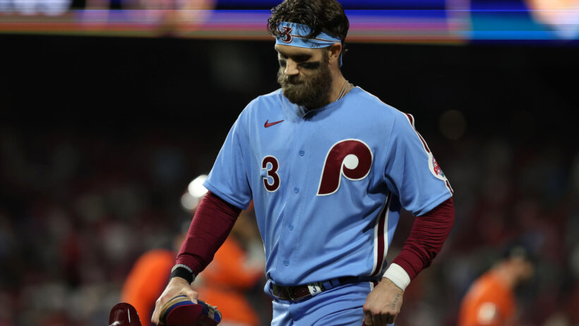 Bryce Harper walks off the field versus Houston