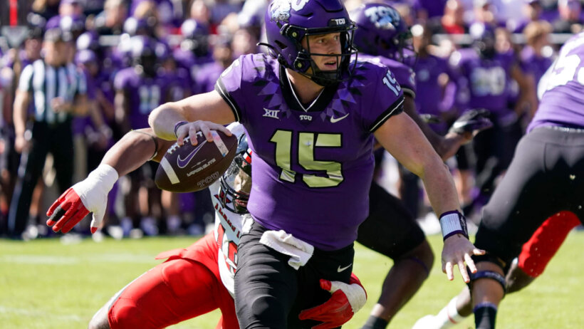 TCU Horned Frogs quarterback Max Duggan avoids the pressure