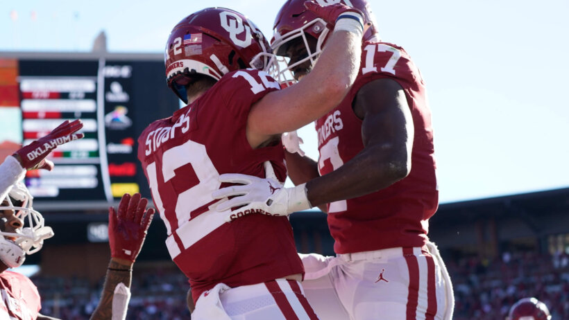 Oklahoma Sooners wide receiver Drake Stoops celebrates with wide receiver Marvin Mims after scoring a touchdown