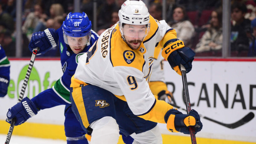 Nashville Predators forward Filip Forsberg reaches for the puck