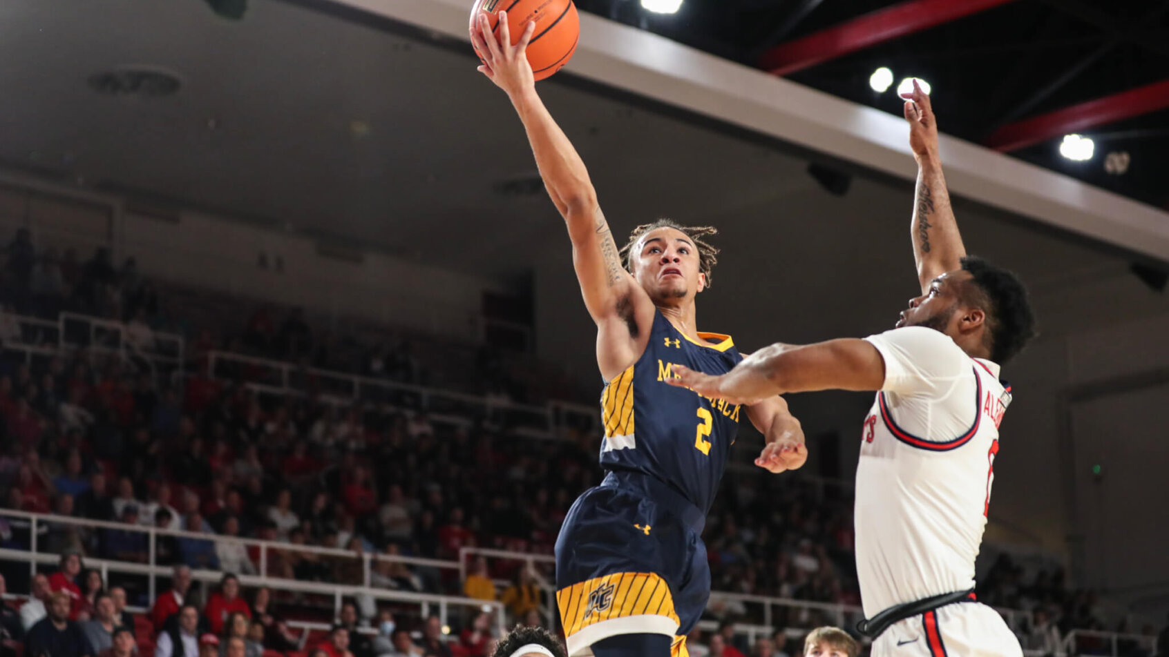 Javon Bennett drives to the hoop versus St. John's.