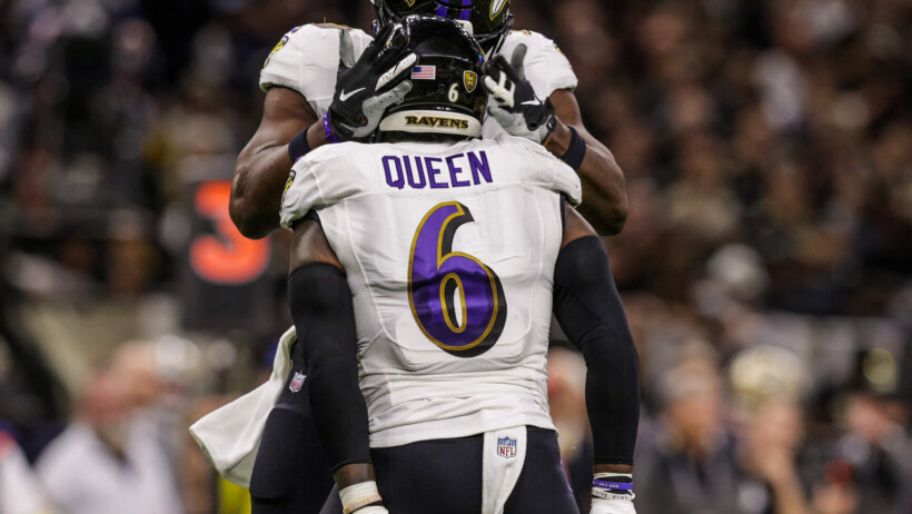 Ravens linebacker Patrick Queen celebrates.