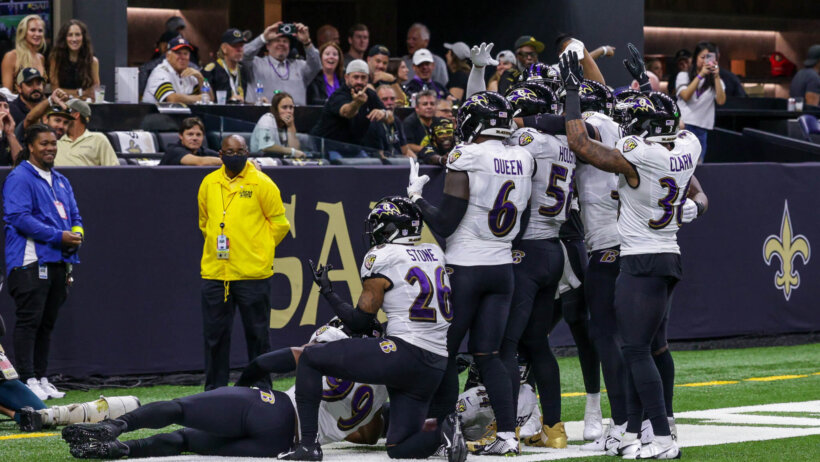 Ravens defenders celebrate