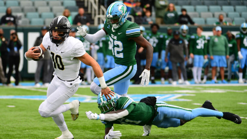 UCF Knights quarterback John Rhys Plumlee runs the ball