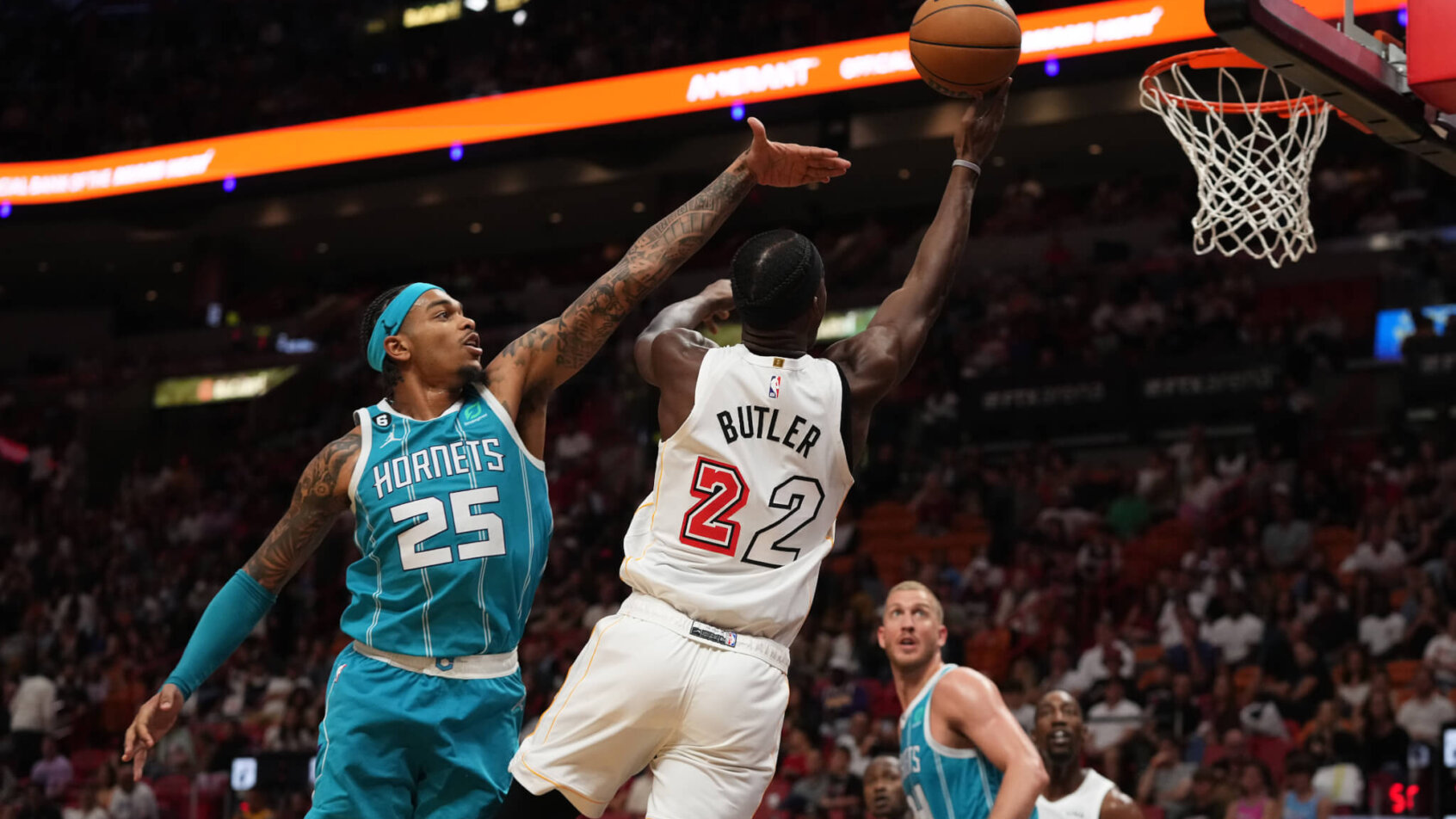 Jimmy Butler drives to the hoop versus the Hornets