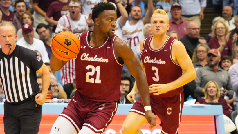 Charleston Cougars guard Jaylon Scott dribbling