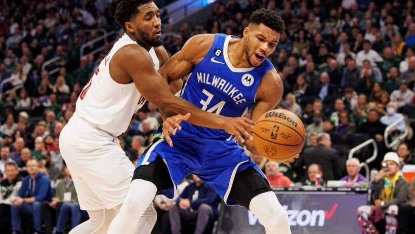 Donovan Mitchell fouls Giannis Antetokounmpo