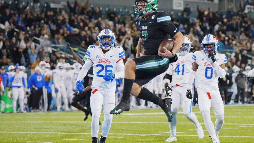 Tulane Green Wave quarterback Michael Pratt jumps into the Endzone