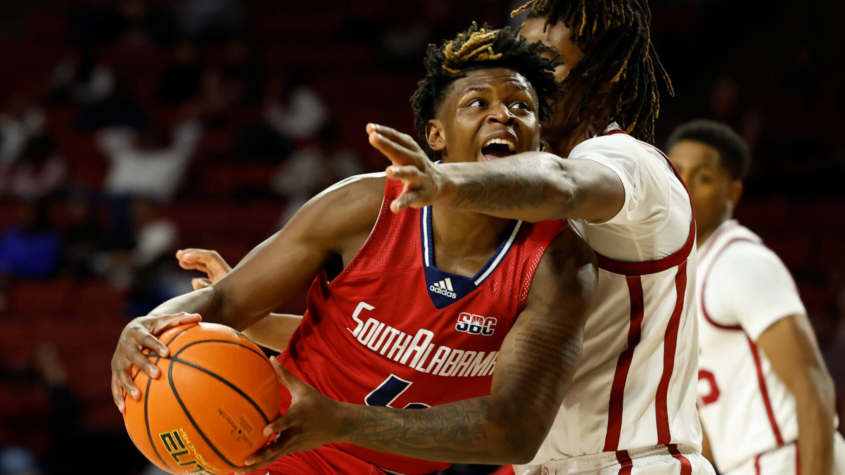 Isaiah Moore drives to the hoop versus Oklahoma.