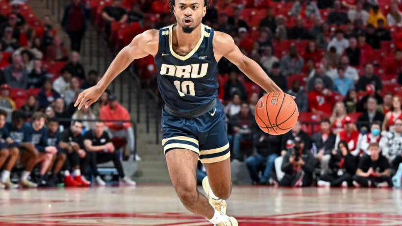 Oral Robert G Isaac McBride diving to the hoop