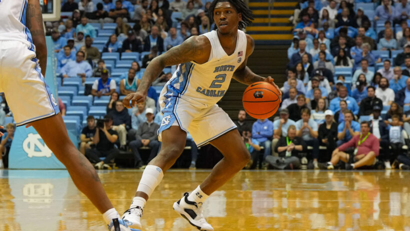 Caleb Love runs the Tar Heels offense