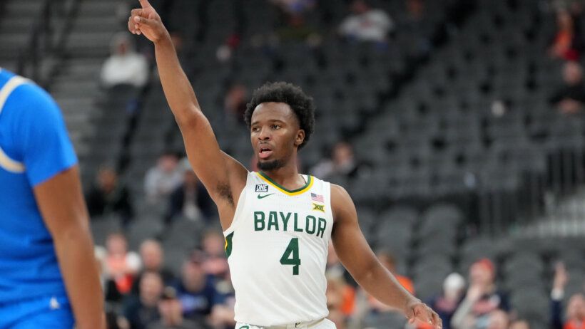 Baylor Bears guard LJ Cryer pointing