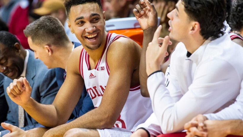 Indiana's Trayce Jackson-Davis talking to Trey Galloway on the bench