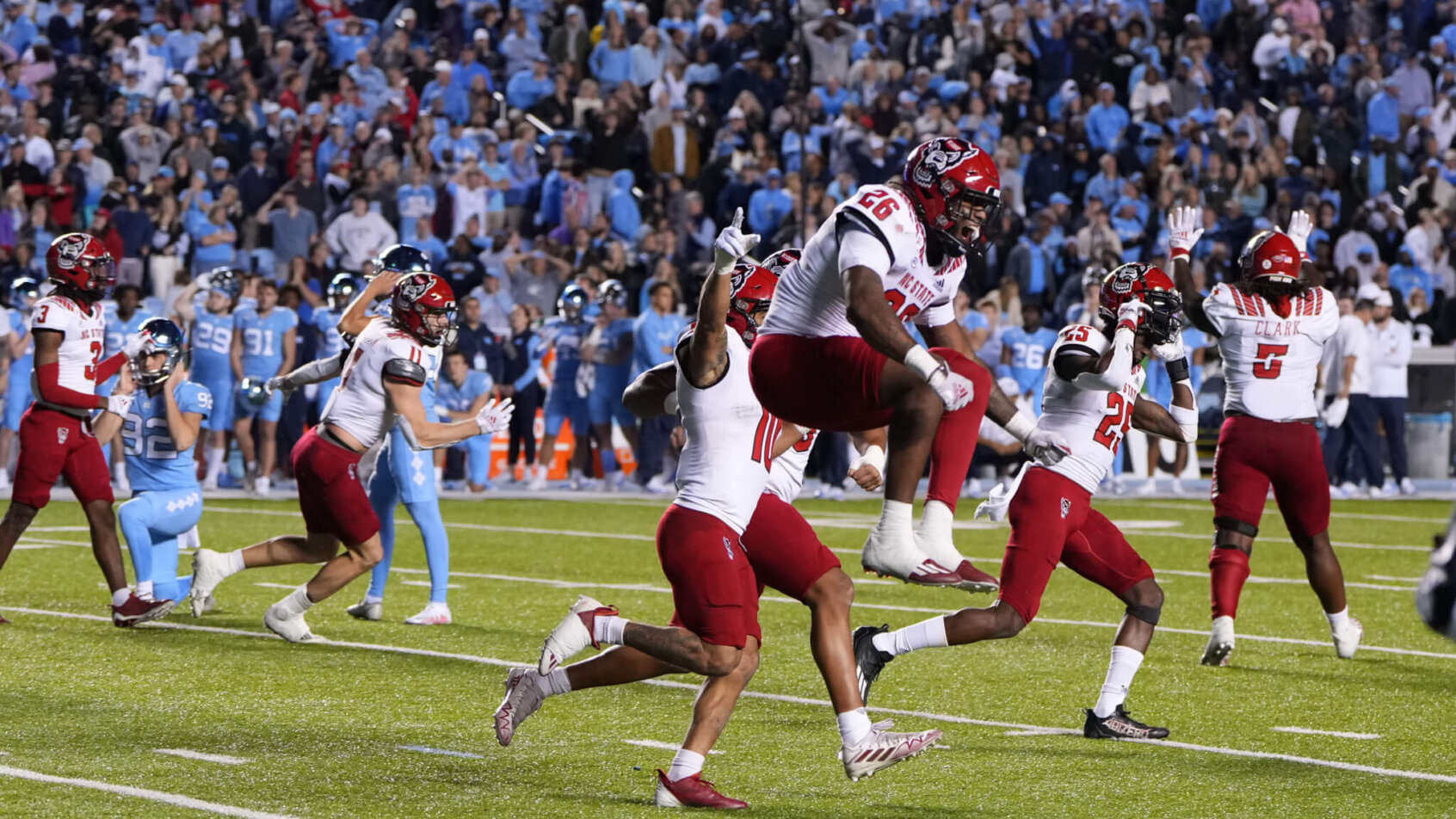NC State celebrates a win over UNC