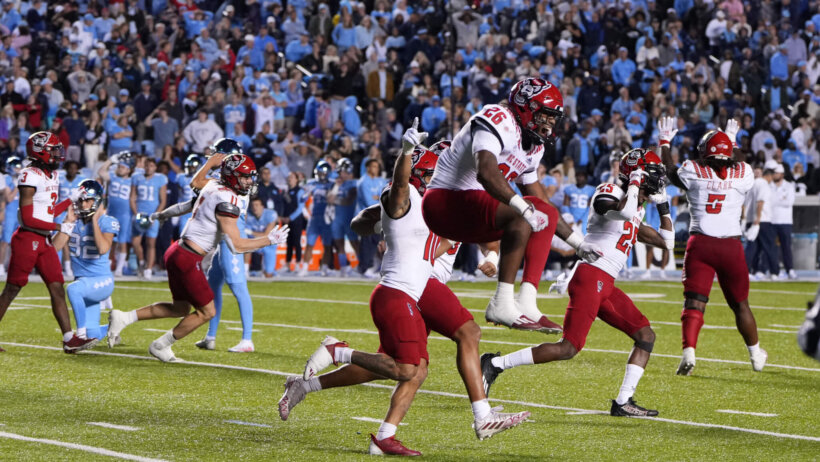 NC State celebrates a win over UNC