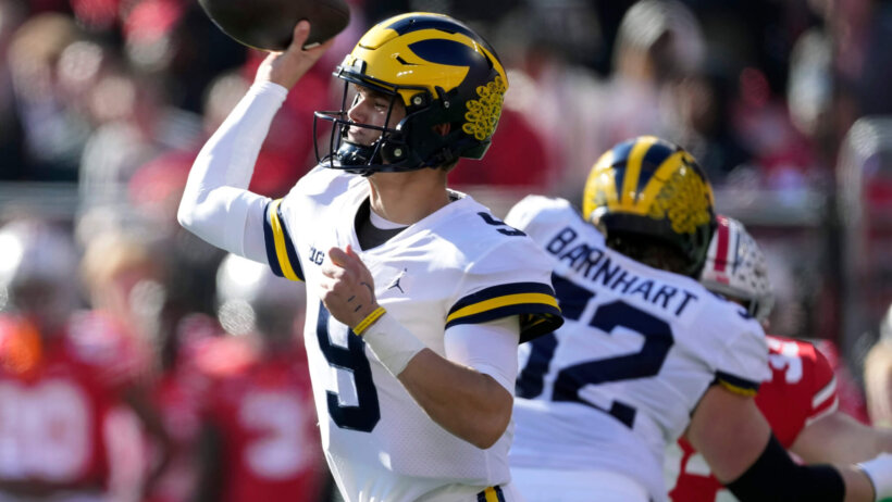Michigan Wolverines quarterback J.J. McCarthy throws the ball