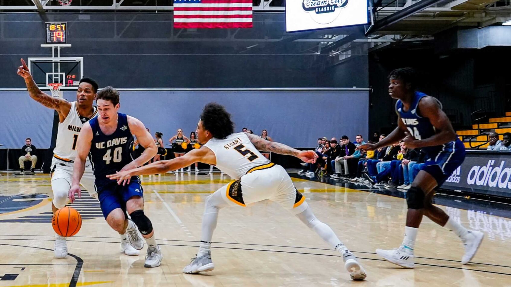 UC-Davis guard Elijah Pepper drives to the hoop