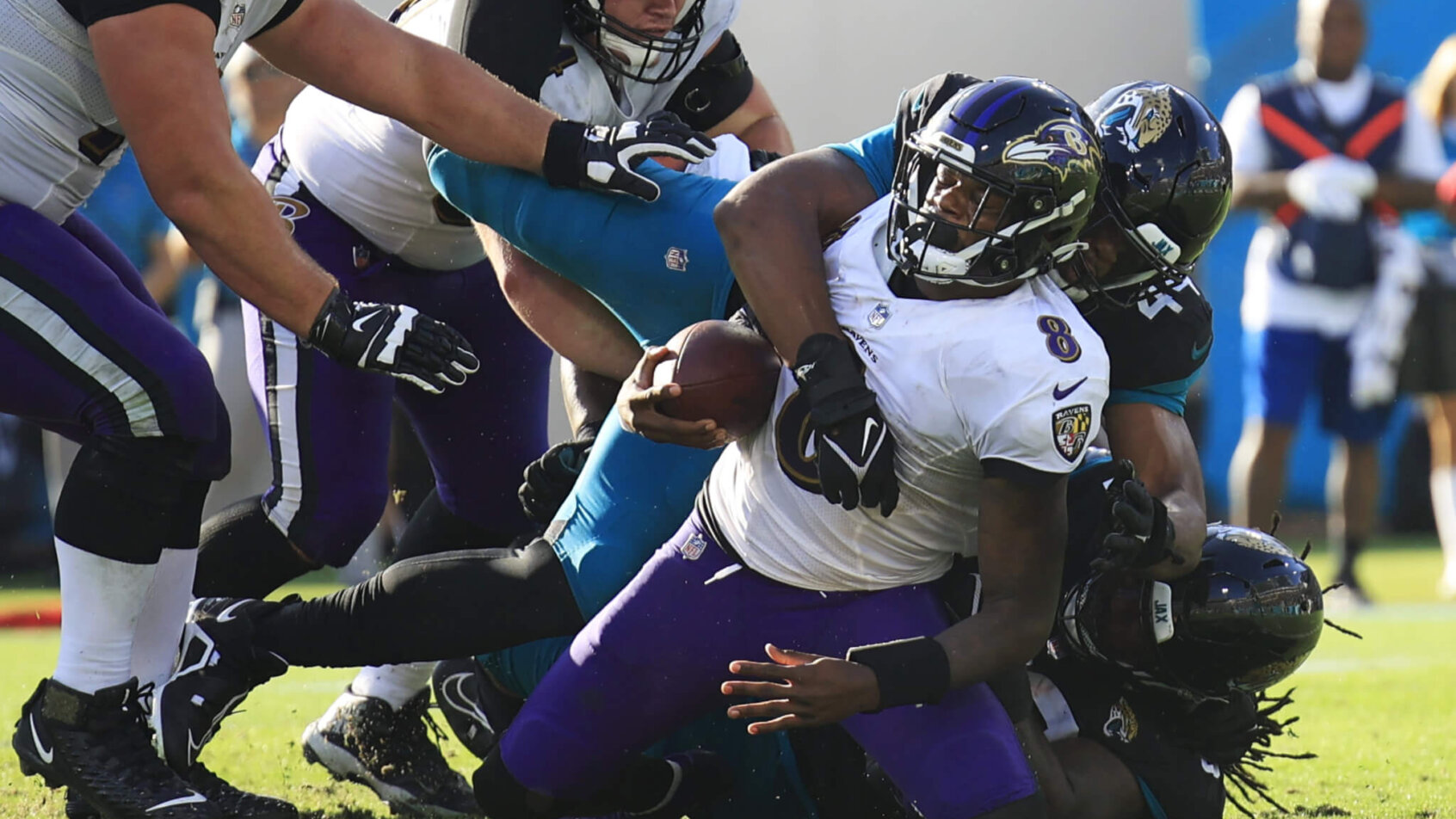Lamar Jackson tackled
