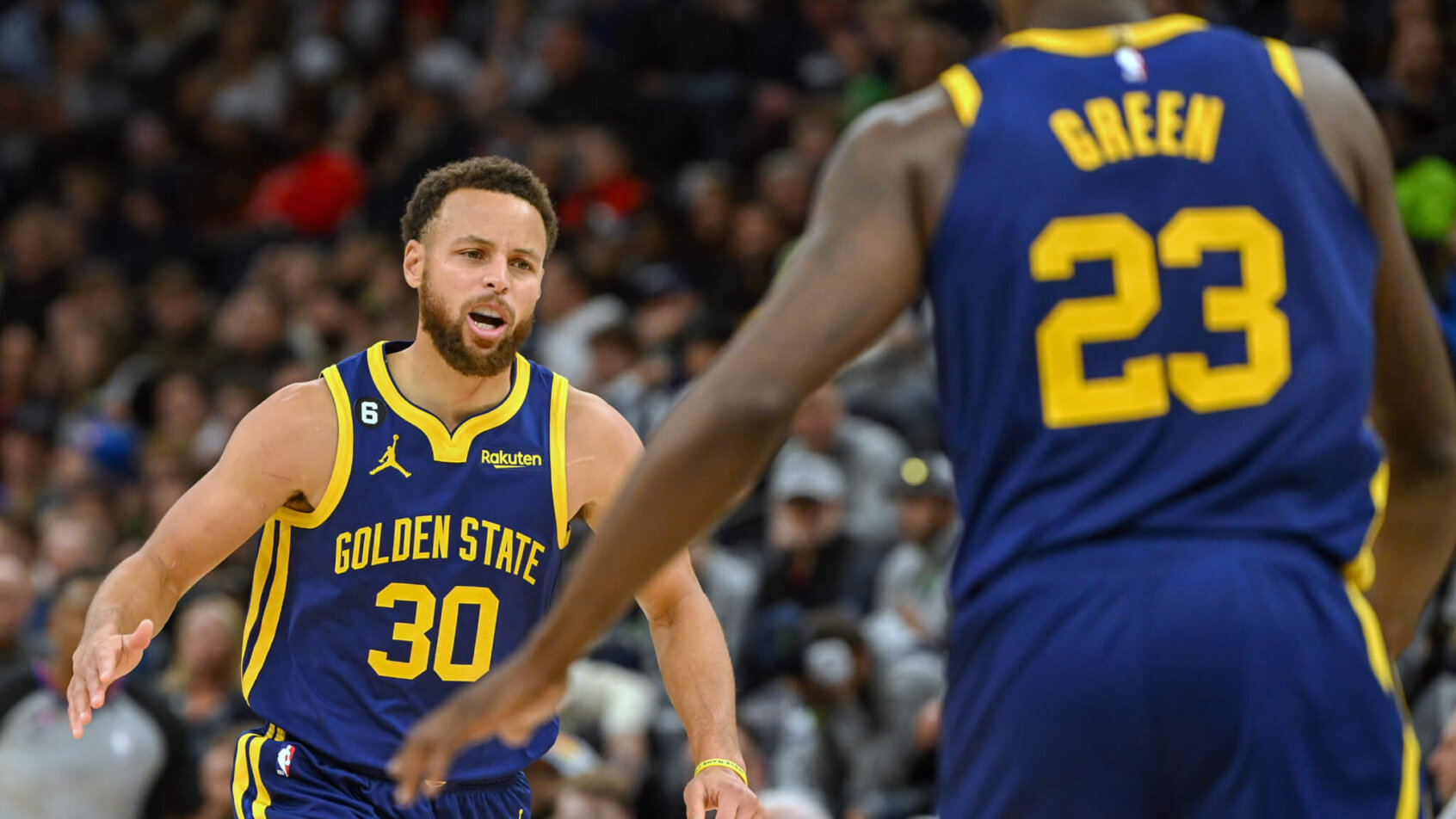Steph Curry and Draymond Green high-five