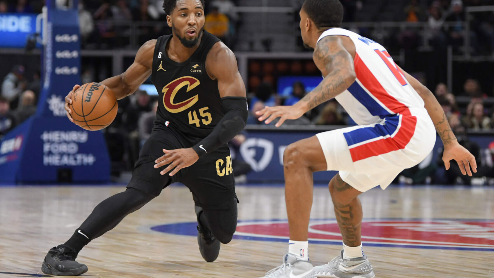 Donovan Mitchell drives versus the Pistons