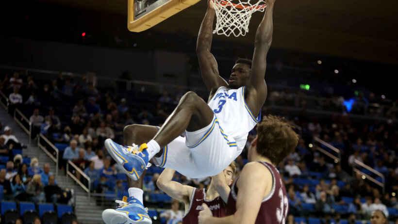 UCLA Bruins forward Adem Bona dunking