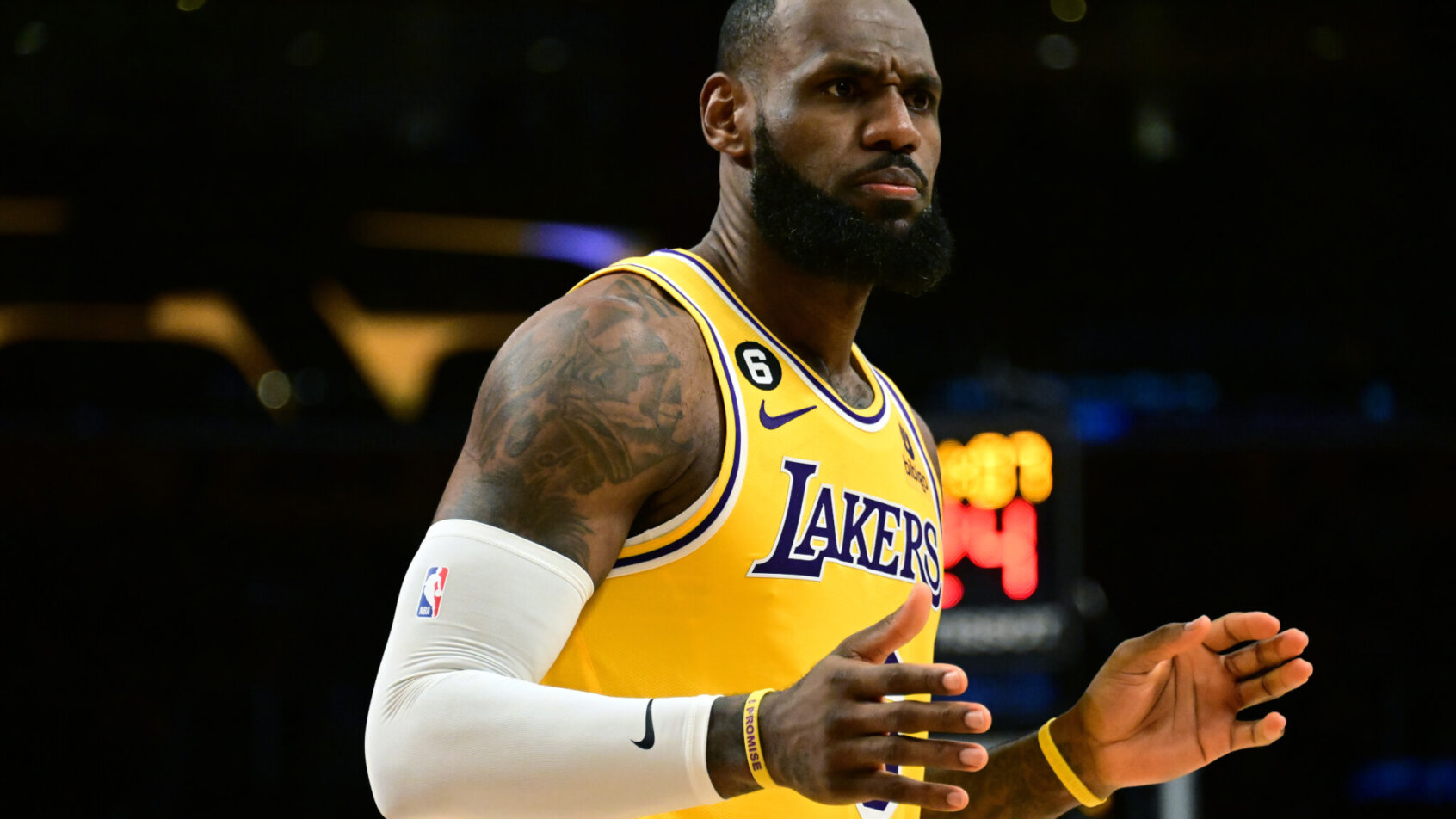 LeBron James hands out, waiting for call