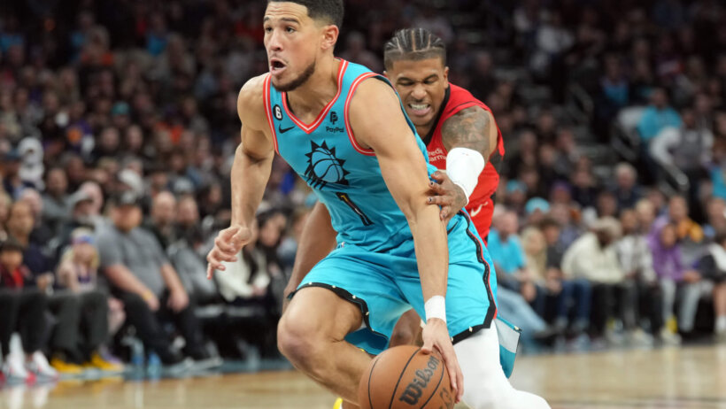 Devin Booker drives to the hoop