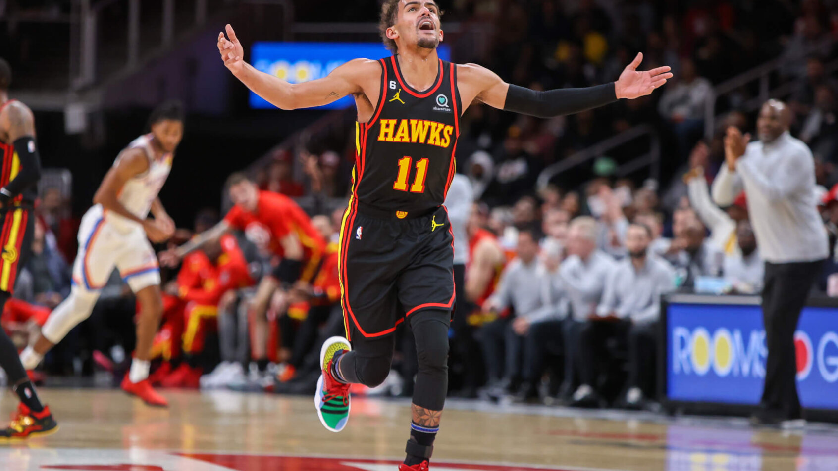 Trae Young arms out reaction