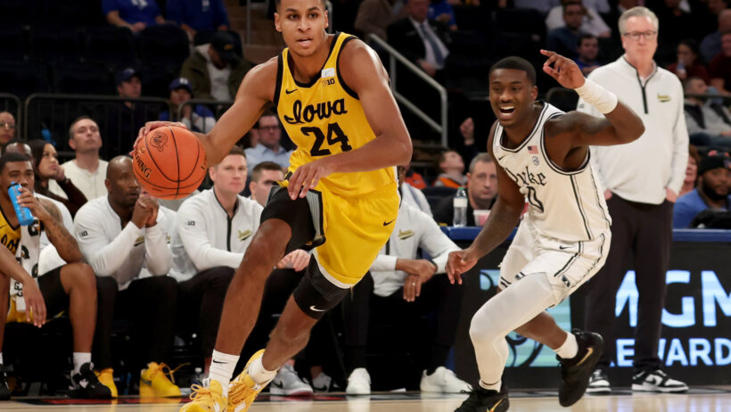 Iowa Hawkeyes forward Kris Murray driving to the basket