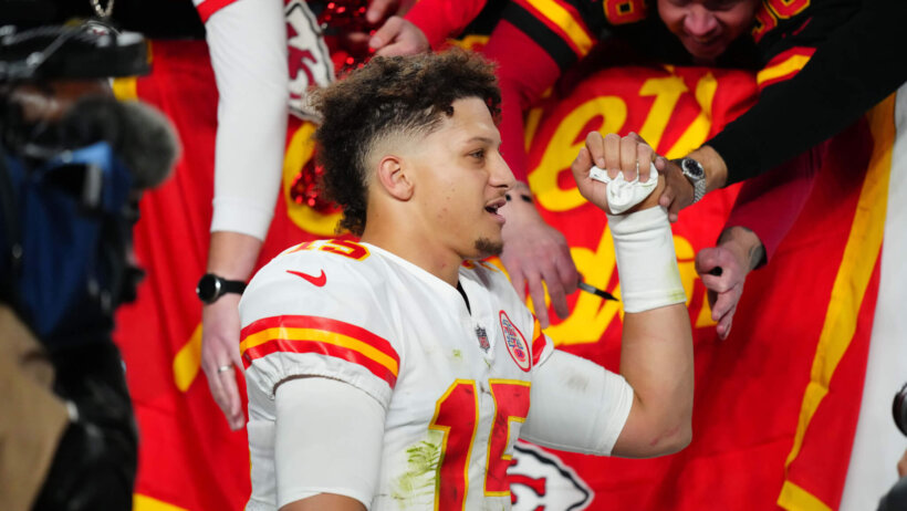 Kansas City Chiefs quarterback Patrick Mahomes raises fist
