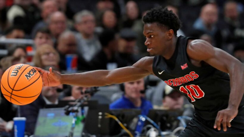 Illinois State Redbirds guard Darius Burford reaches for a loose ball