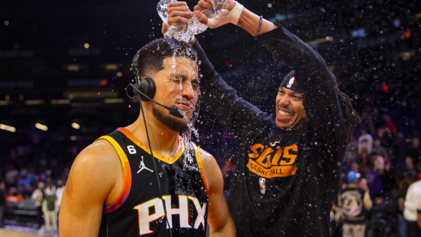 Devin Booker showered during a post-game interview