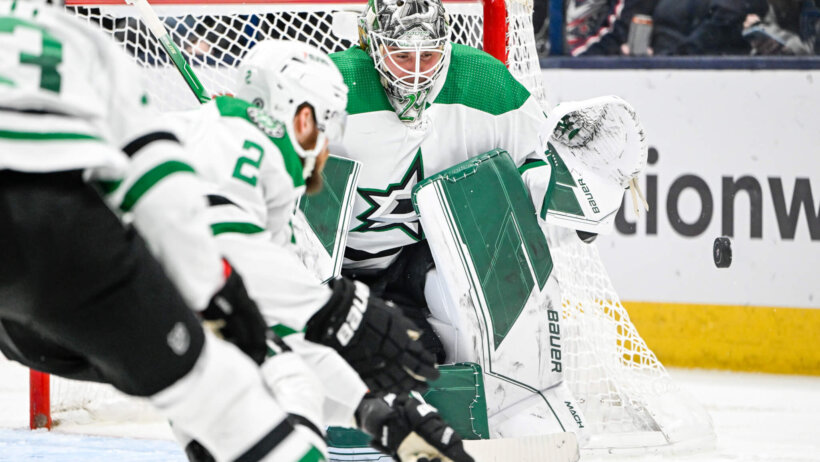 Dallas Stars goaltender Jake Oettinger makes a save