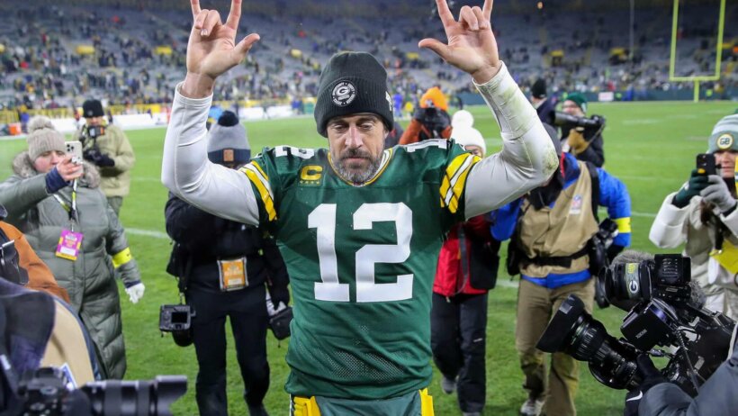 Green Bay Packers quarterback Aaron Rodgers leaves the field
