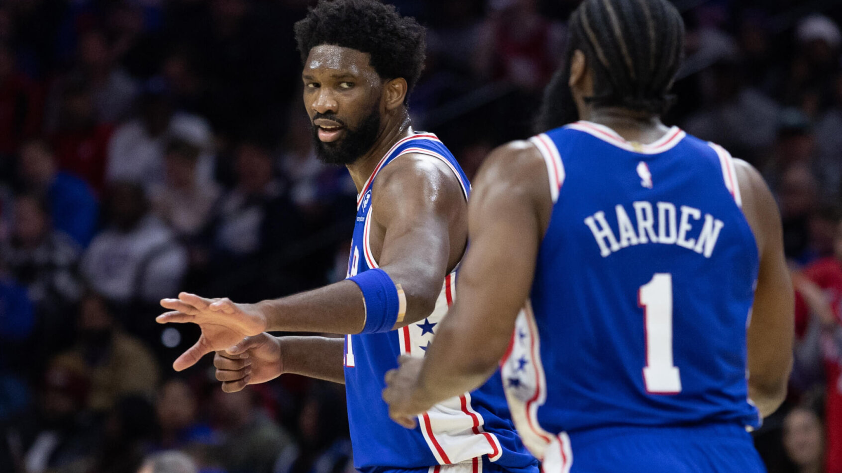 James Harden and Joel Embiid high five