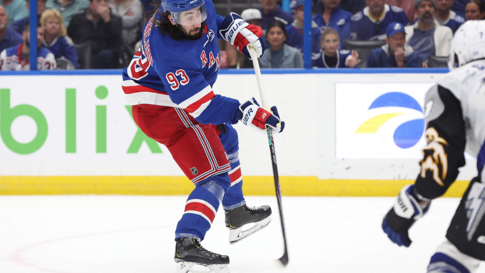 Mika Zibanejad shoots puck