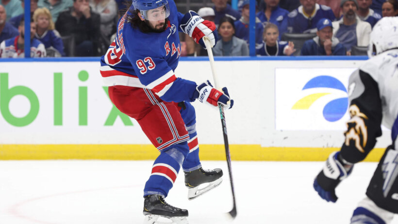 Mika Zibanejad shoots puck
