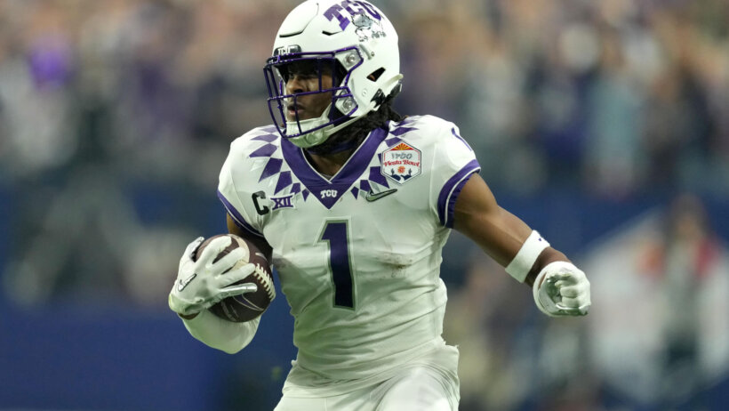 Quentin Johnston running in open field