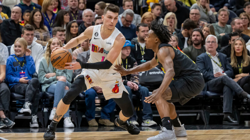 Tyler Herro defended by Collin Sexton.
