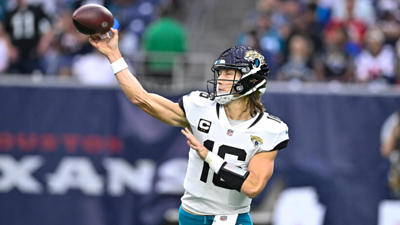 Jacksonville Jaguars quarterback Trevor Lawrence throws the ball