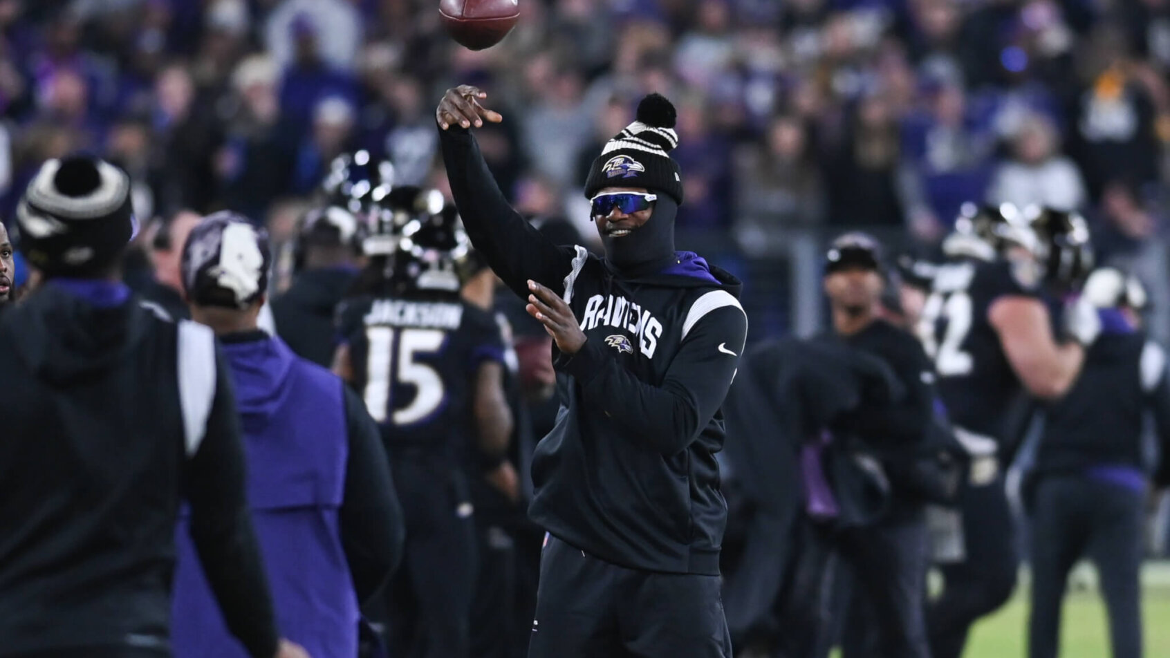 Lamar Jackson throwing on sideline
