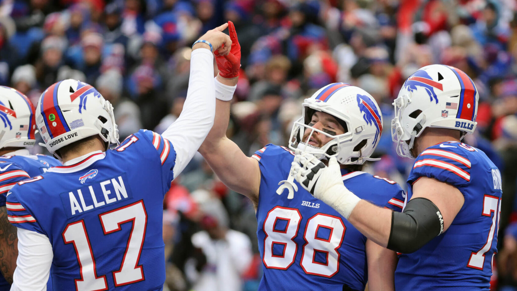 Josh Allen handshake celebration with Dawson Kncx