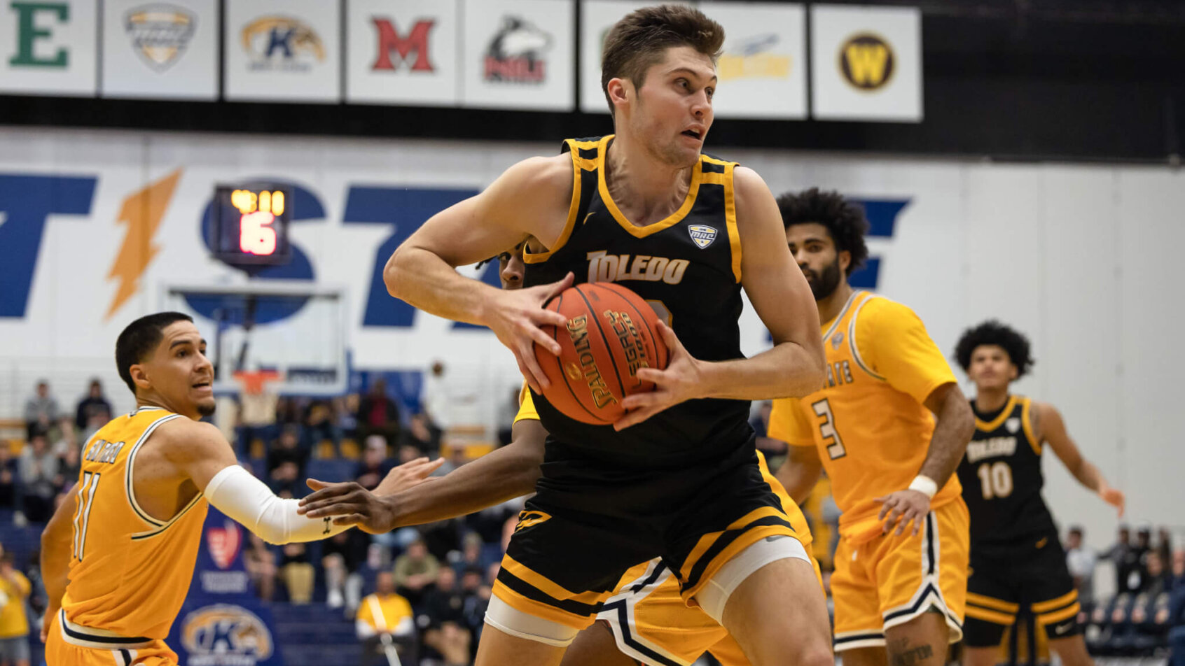 Toledo forward JT Shumate holding basketball