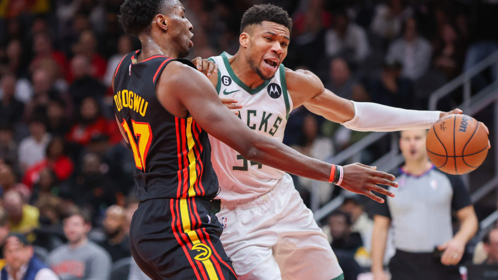Giannis Antetokounmpo drives on Onyeka Okongwu