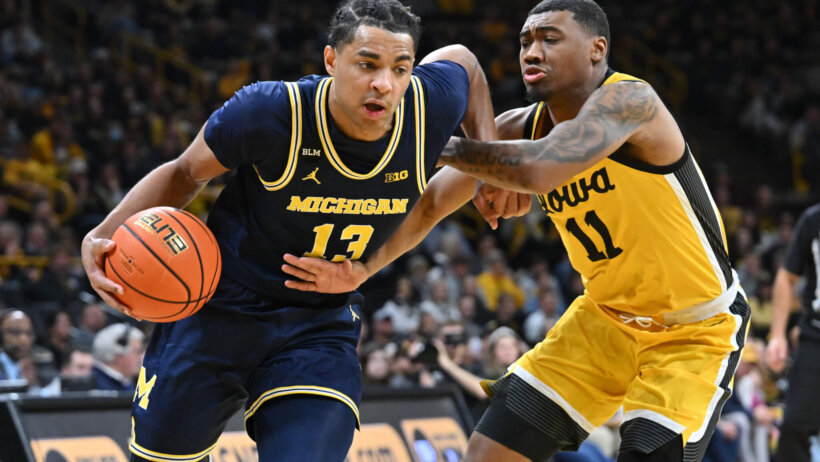Jett Howard drives; Michigan Wolverines