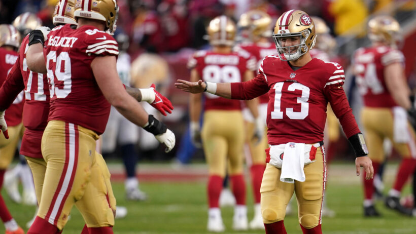 49ers QB Brock Purdy shaking hands