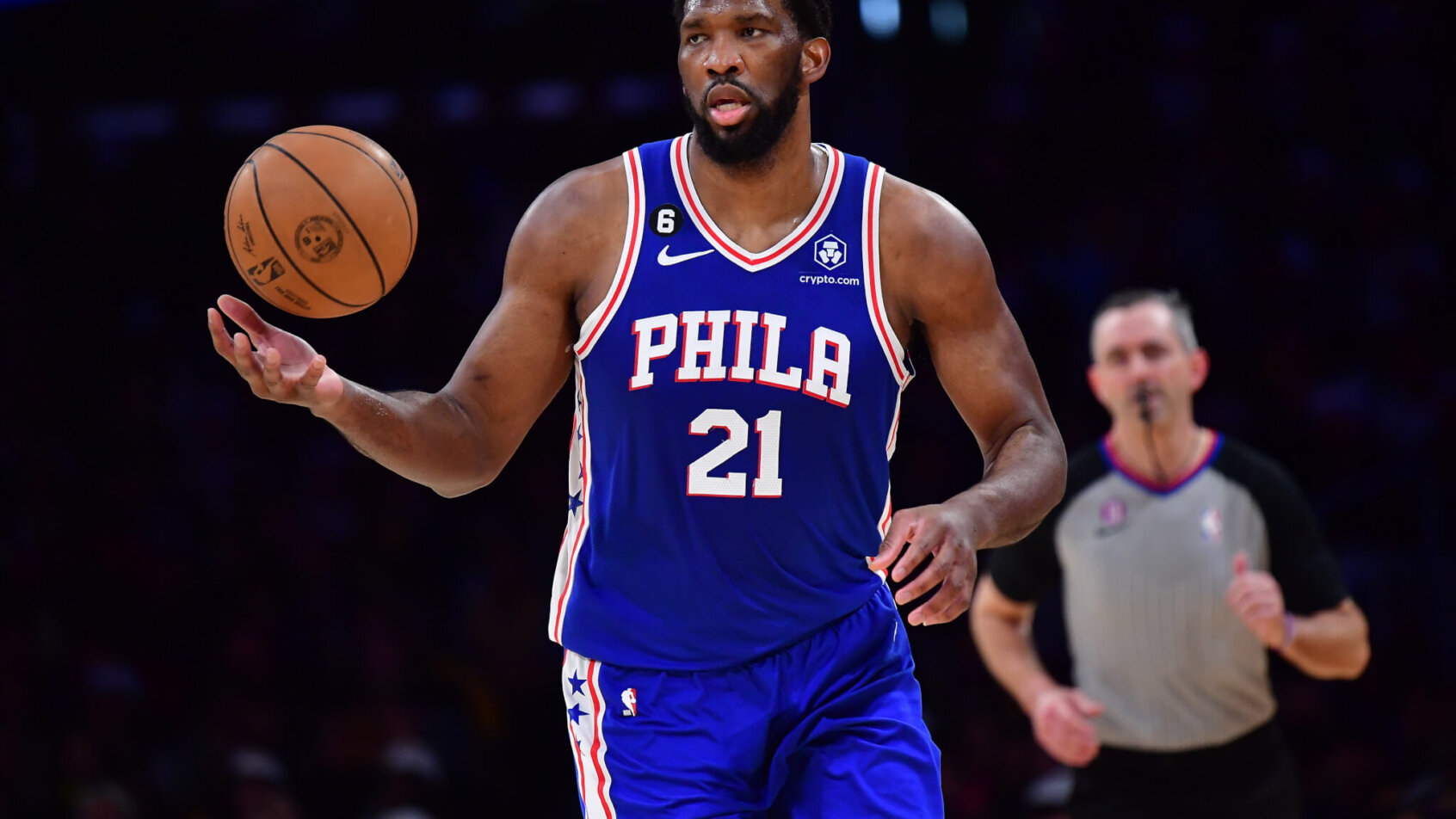 Joel Embiid dribbling ball